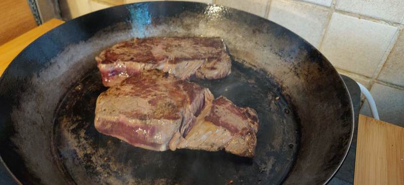 Steak being cooked