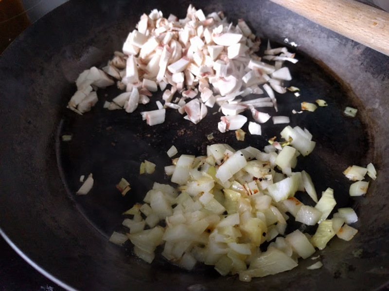 Onion softened, mushroom just gone in